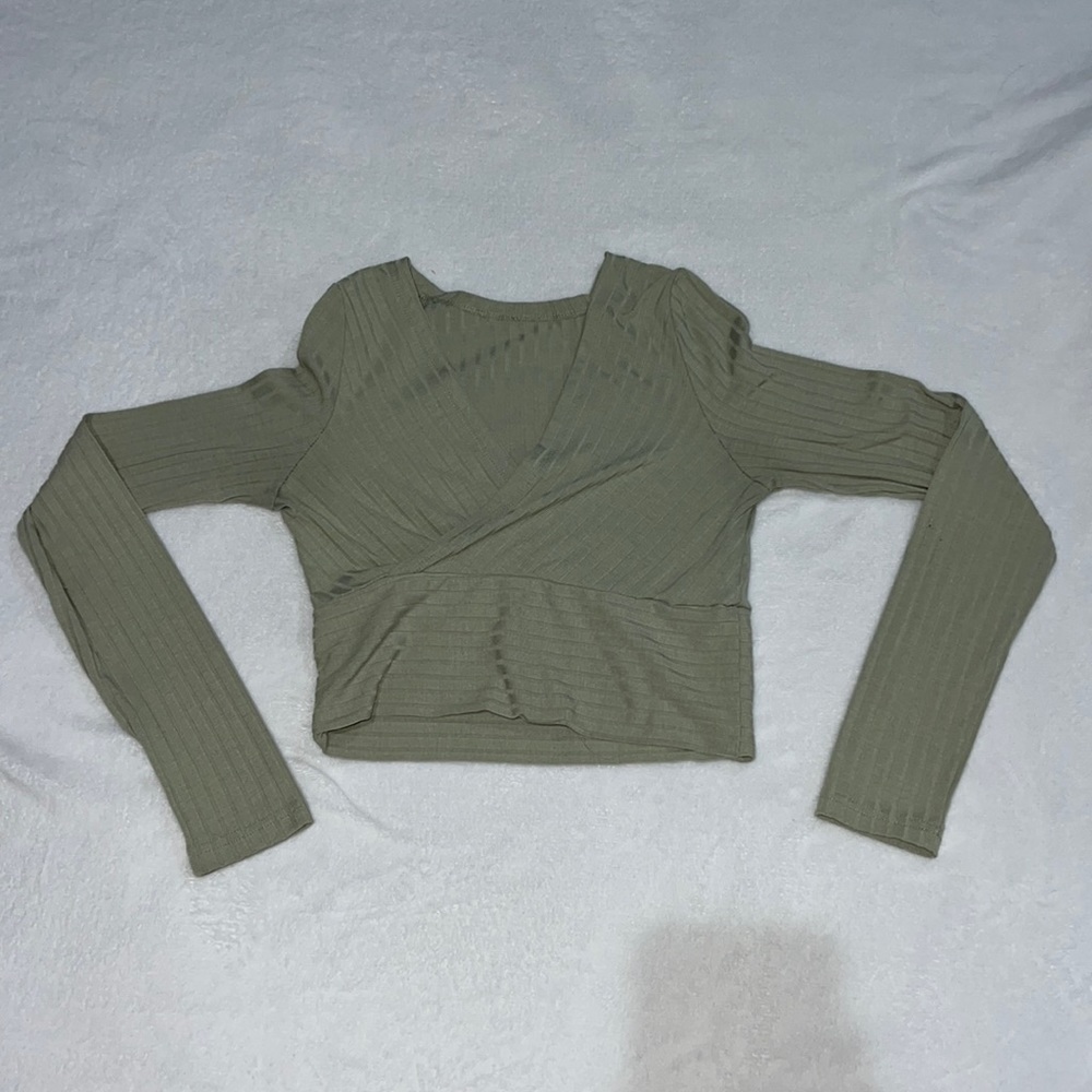 light green long sleeve shirt.